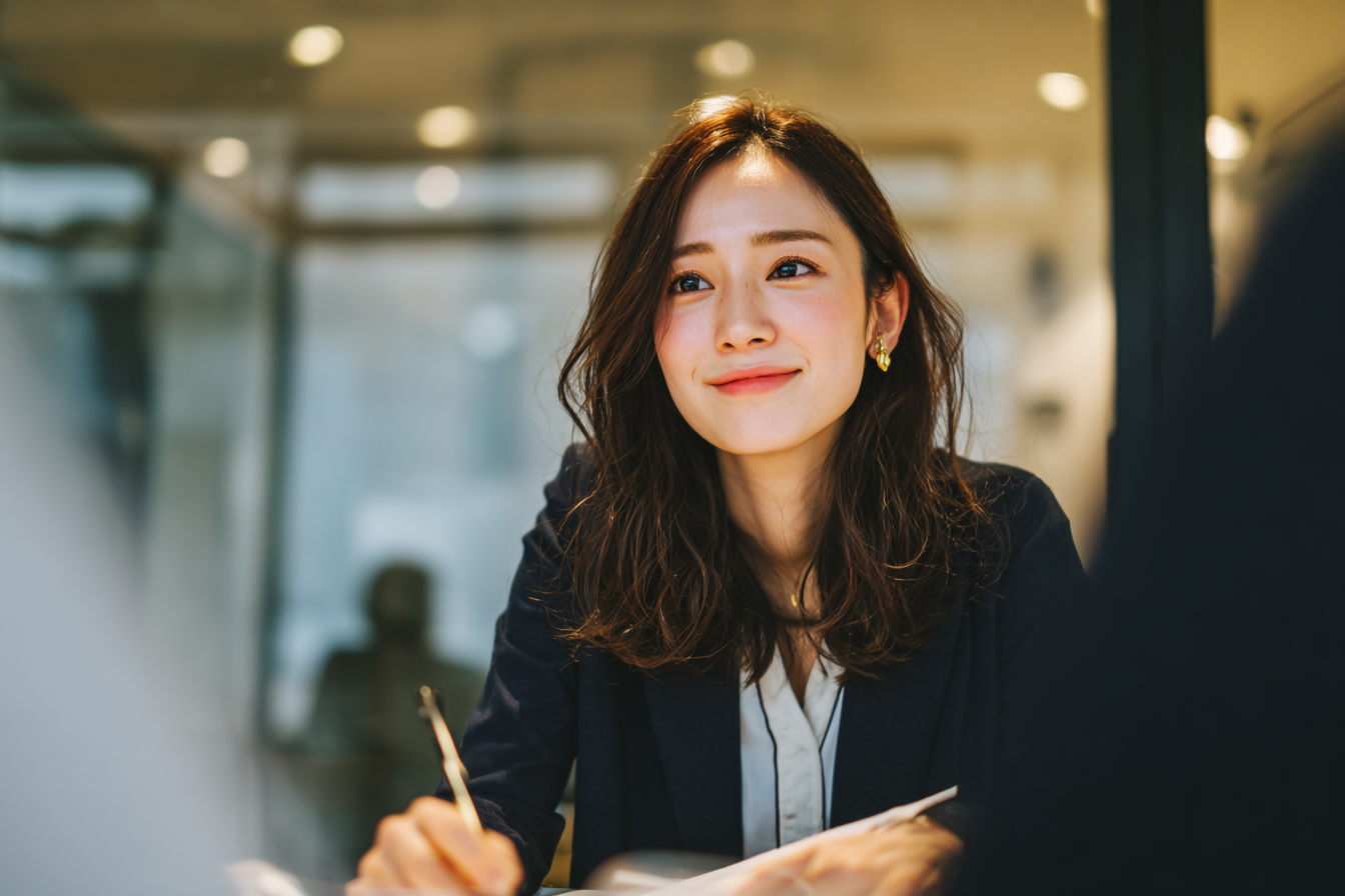 Smiling woman in a meeting